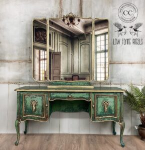 Green terra-painted vanity distressed to look old and worn.