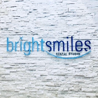 Bright Smiles Dental Studio Company Logo by Dr. Carlos Garcia in Glendale CA