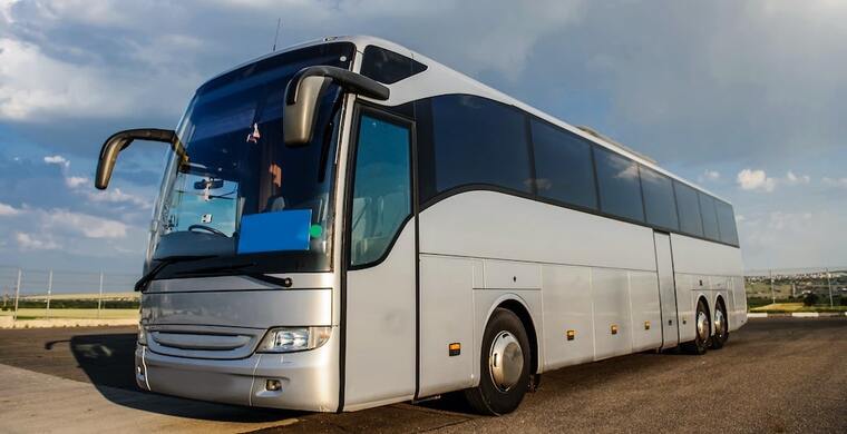 Experience Comfortable and Convenient Group Travel with Punctual Express Coach Bus Rental Services